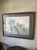 Full view of framed print on wall