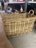 overall view of rectangular wicker basket showing weave and handles