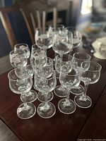 All 16 stemmed glasses grouped on table