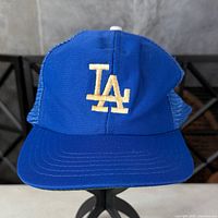 Front view showing LA logo and brim