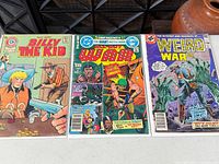 Front covers of all three comics side by side