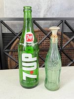 Front view of both bottles showing logos and colors
