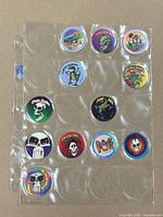 Front view of clear sleeve holding 11 milk caps