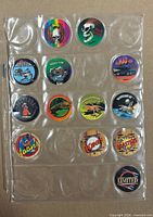 Full view of all 15 pogs in plastic sleeve