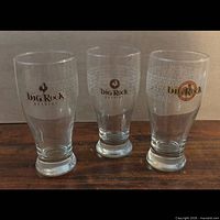 Front view of three Big Rock Brewery pint glasses