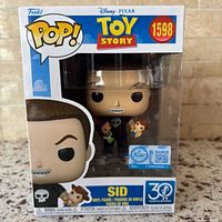 Front view of boxed Funko Pop Sid #1598