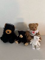 Front view of all four bears side by side