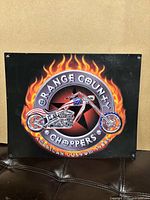 Front view of OCC metal wall sign