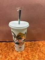 Full view cup with lid and straw inserted