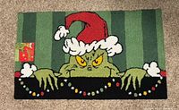 Full view of Grinch doormat front side