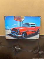 Front view of printed tin wall sign
