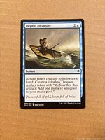 Front of Depths of Desire card showing artwork, mana cost, text box, collector number 53/279
