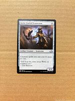Front of Geist-Fueled Scarecrow card showing artwork, text, set symbol, and condition