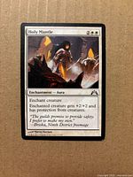 Card front displaying title, mana cost, artwork, text box, rarity, set symbol