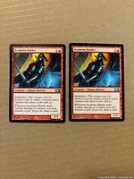 Both Academy Raider cards front view