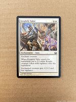 Front of Knightly Valor card showing artwork, mana cost, text, copyright 2012