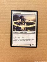 Front of Soulmender card showing artwork, text, set symbol