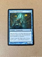 Front of Stitcher's Apprentice card showing artwork, mana cost, text, and border