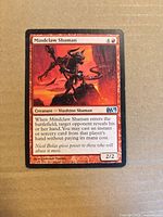 Front of Mindclaw Shaman card showing artwork, text and set symbol