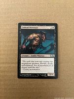 Front of Undead Minotaur card showing name, mana cost, artwork, set symbol and condition