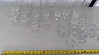 Top view of entire group of crystal goblets showing both sizes and quantity