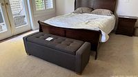 Storage bench at foot of bed showing overall size and design