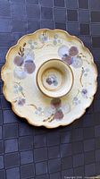 Top view of platter showing design, glazing and integrated dip bowl