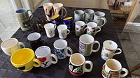Overall view of all mugs and glass cups on table