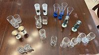 All 18 assorted glasses arranged on table