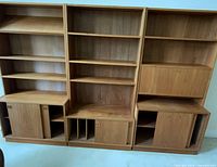 front view of full three-section teak wall unit