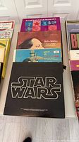 Front stack showing Star Wars soundtrack, Billie Holiday and others