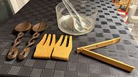 Overview of all wooden and acrylic serving pieces on table