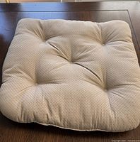 Single beige dotted cushion close-up