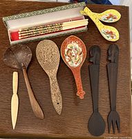 Overall lot showing all nine utensils and boxed chopsticks