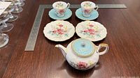 Full set showing all eight pieces on table