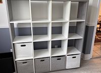 Front view of cube organizer with bins inserted