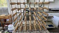 Front view of entire 6×6 wine rack on countertop