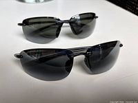 two pairs of Maui Jim Sport sunglasses front view