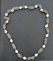 Entire necklace showing link and bead pattern