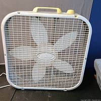 Front view of Lasko 20-inch box fan showing blades and grill