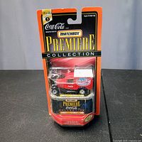 Front view of sealed Matchbox Premiere Collection Coca-Cola Model A Ford truck package