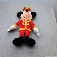 Full-body view of the 22" Mickey Mouse plush showing entire marching band uniform