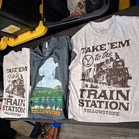 All three Yellowstone T-shirts laid out