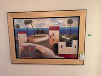 Front view of framed coastal landscape print showing artwork, frame and glazing