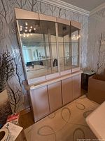 Full view of china cabinet showing upper glass display area and lower storage