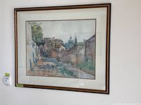 Full view of framed watercolor on wall
