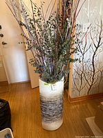 Full view of vase with decorative stems