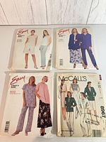Group shot of all four sewing pattern envelopes