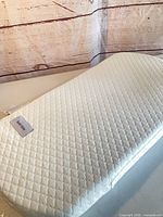 Full view of reversible contoured pad on table