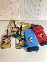 Overview of two sock pairs and three luggage tags